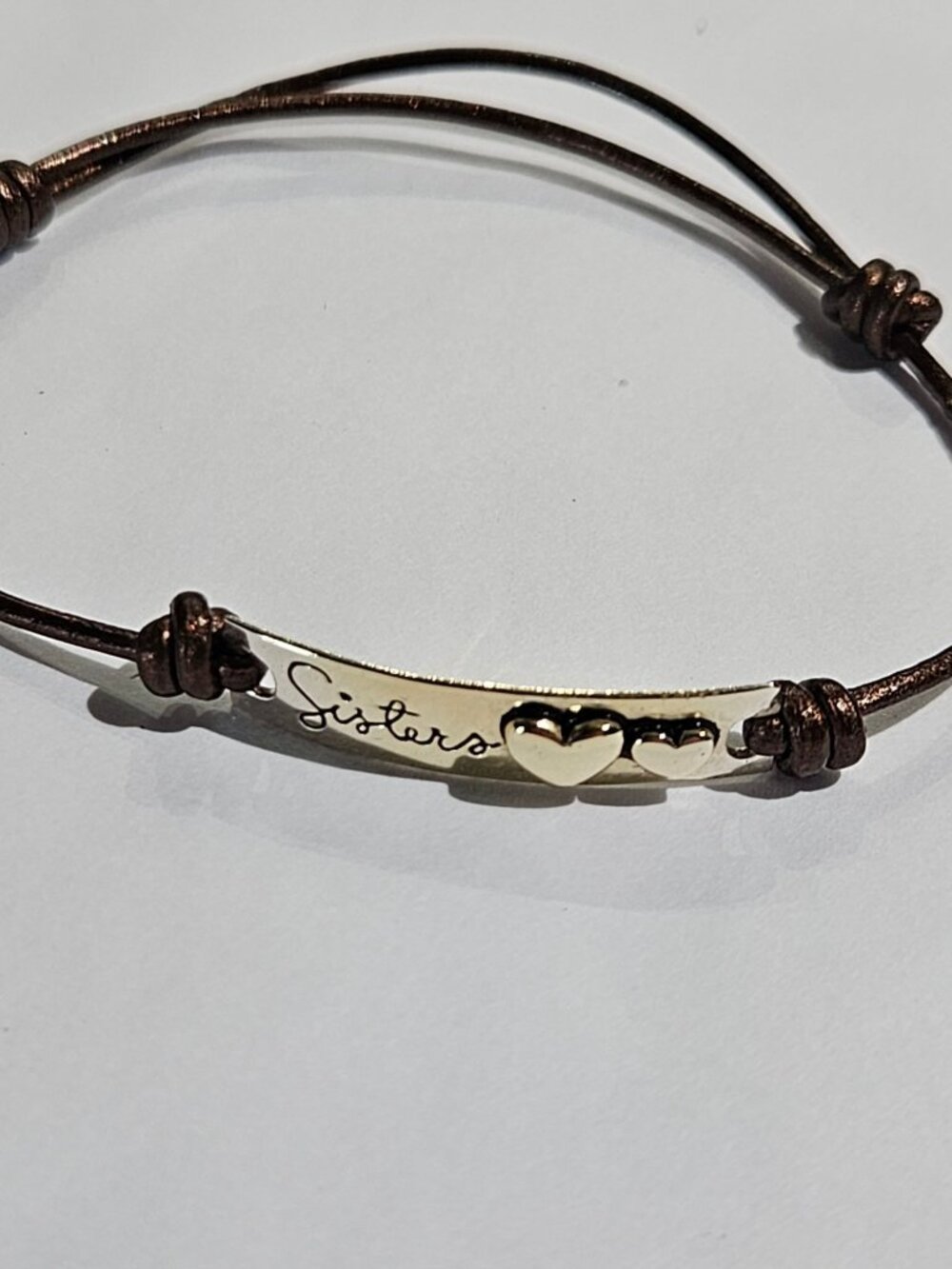 Silvertone Sisters Bracelet Hearts Brown Cord Adjustable